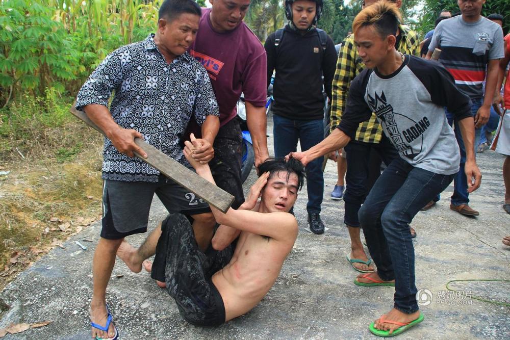 印尼200名囚犯越狱 被围追警民暴揍