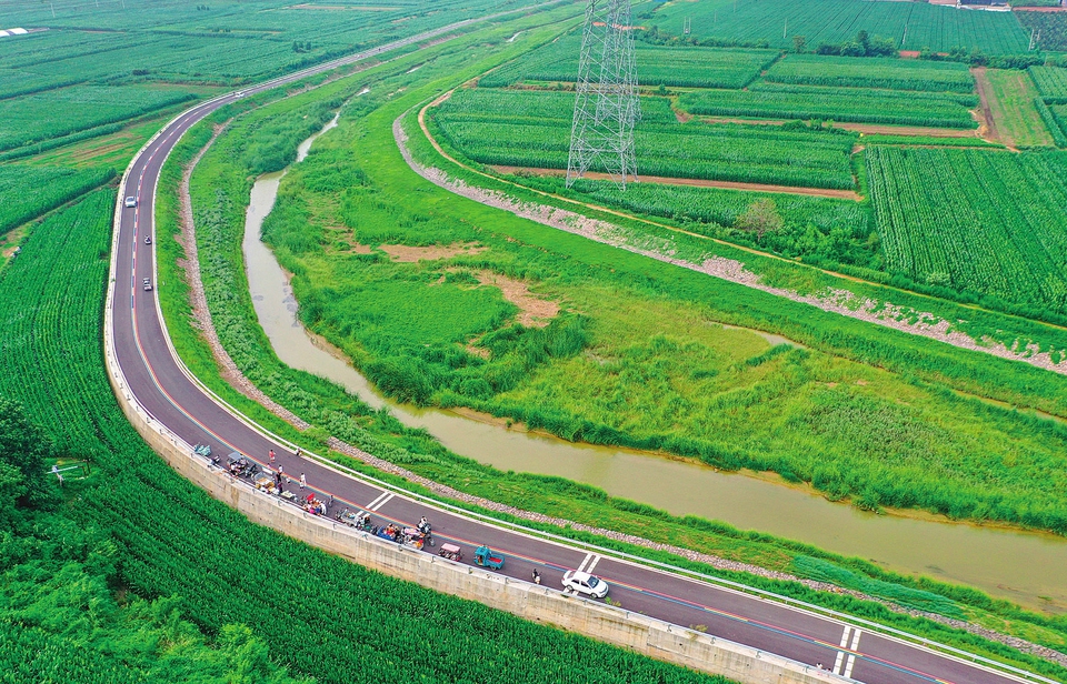 河随路畅 乡以景兴